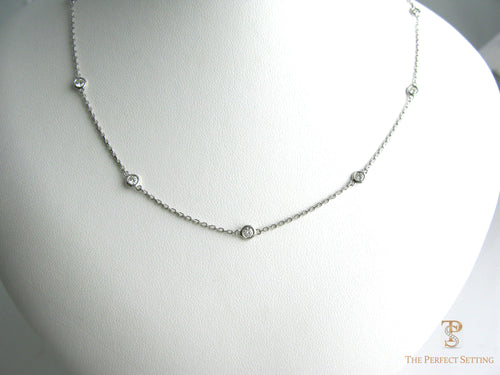 bezel-set necklace round brilliant cut diamonds