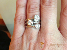 Load image into Gallery viewer, three stone bezel ring diamonds on hand