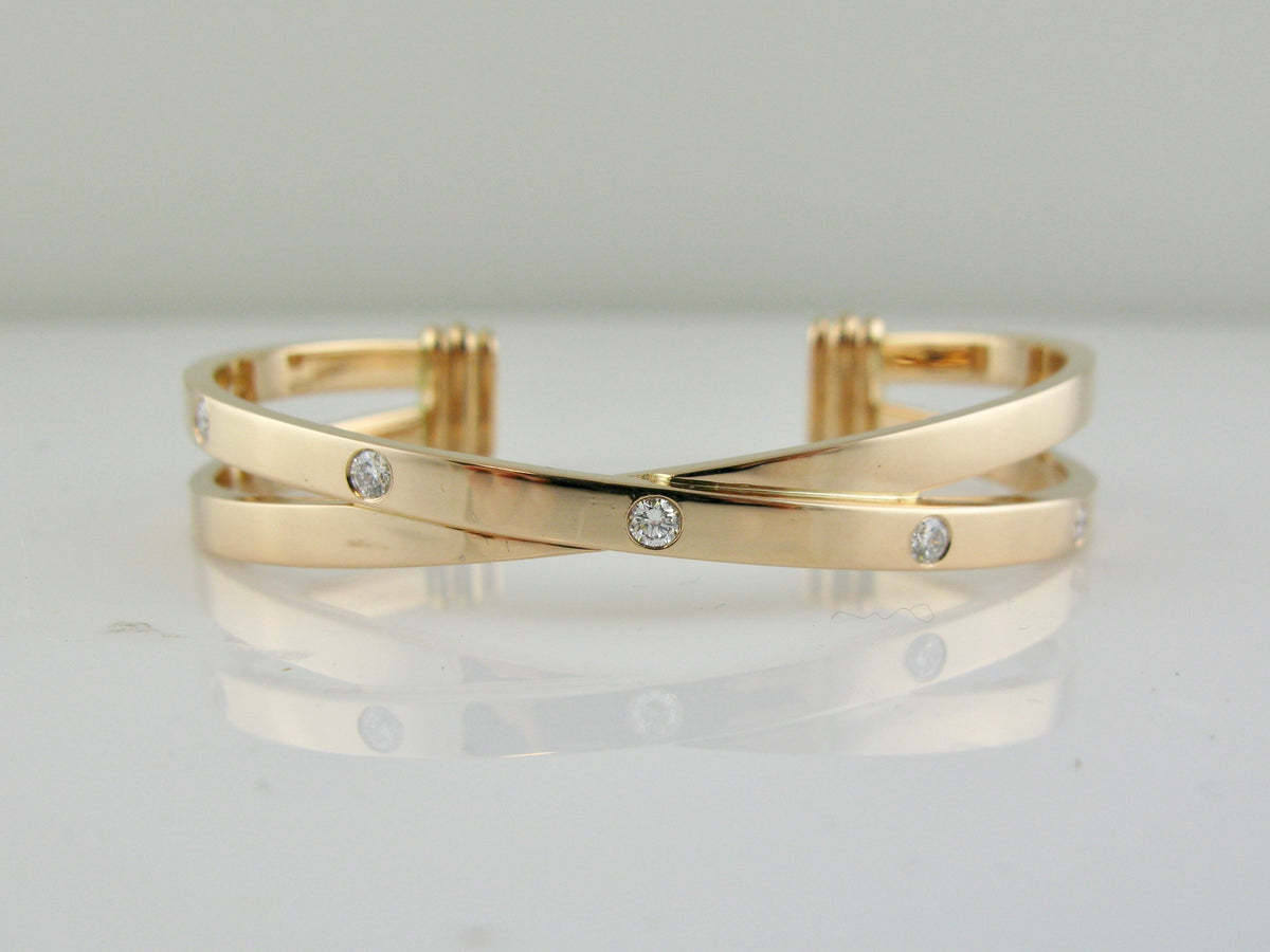 gold and diamond criss cross bracelet