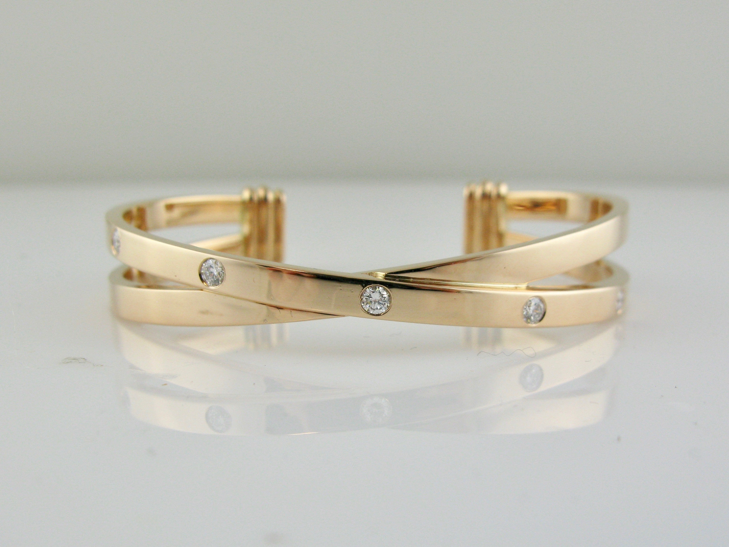 gold and diamond criss cross bracelet