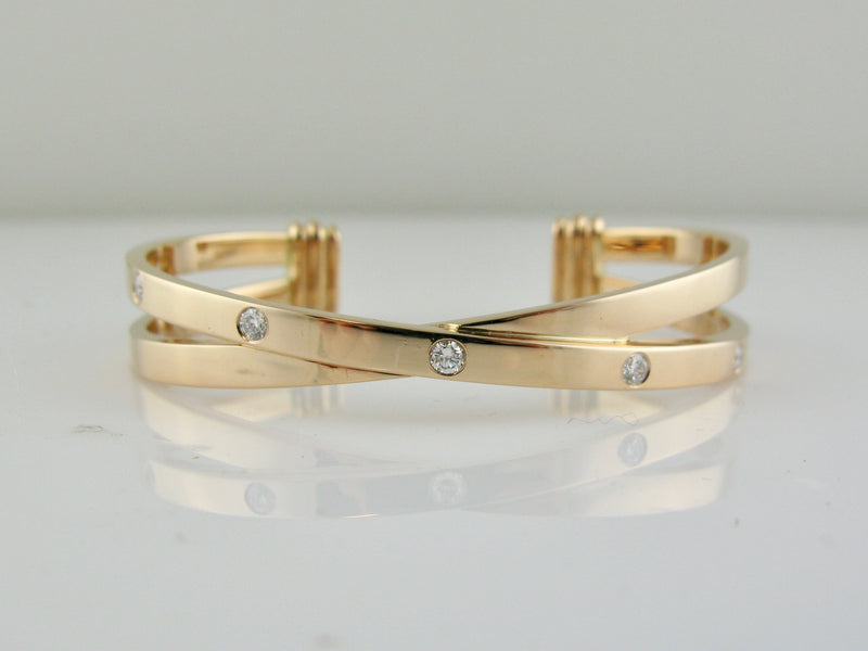 gold and diamond criss cross bracelet