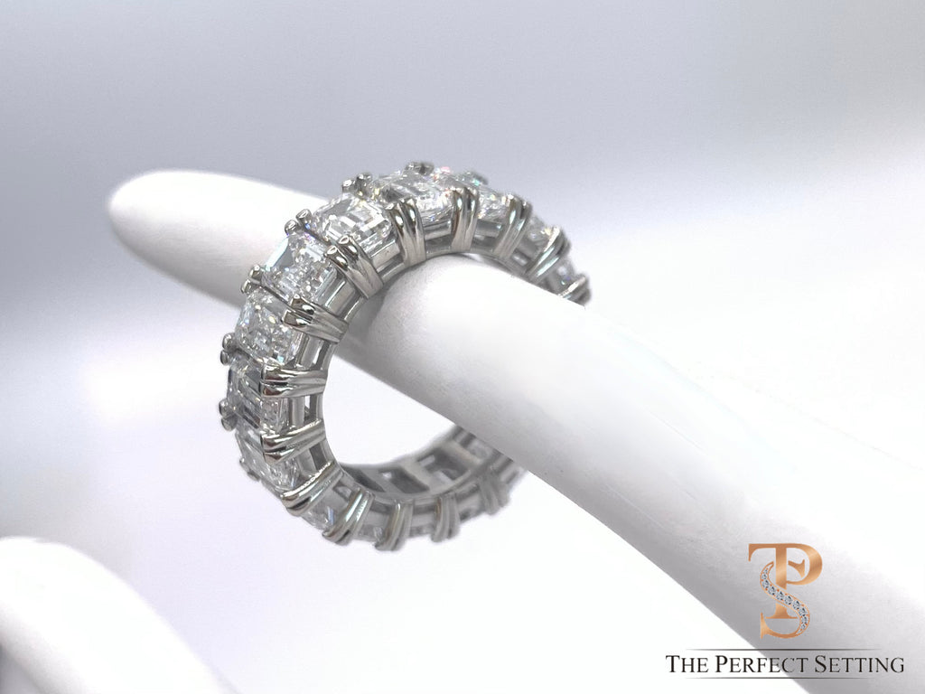Lab Diamond eternity  ring on a white stand with 'The Perfect Setting' logo.
