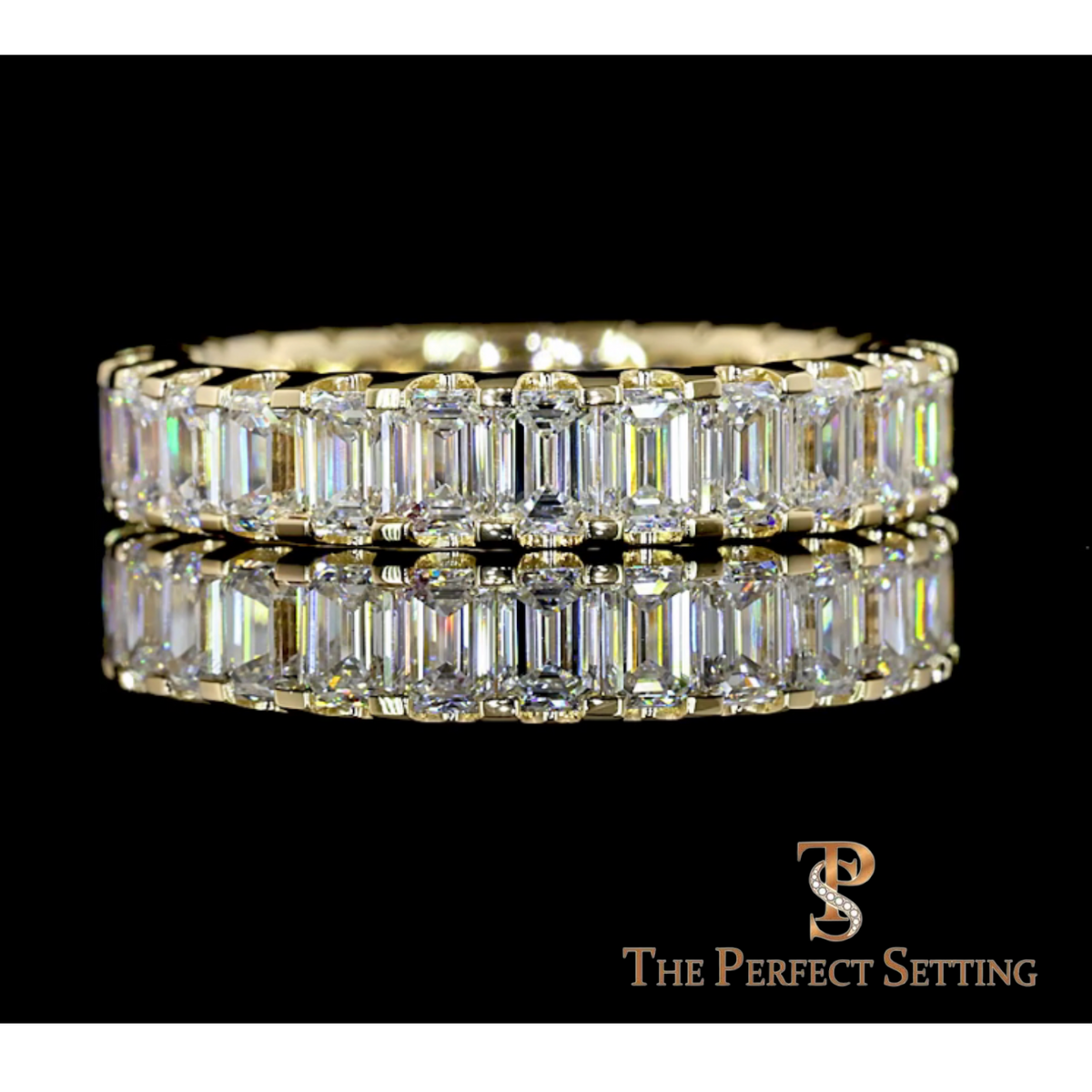 The Perfect Setting, Inc. custom emerald-cut diamond eternity band featuring approximately 6 CTW of sparkling diamonds.
