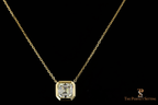 Asscher cut diamond bezel necklace in yellow gold