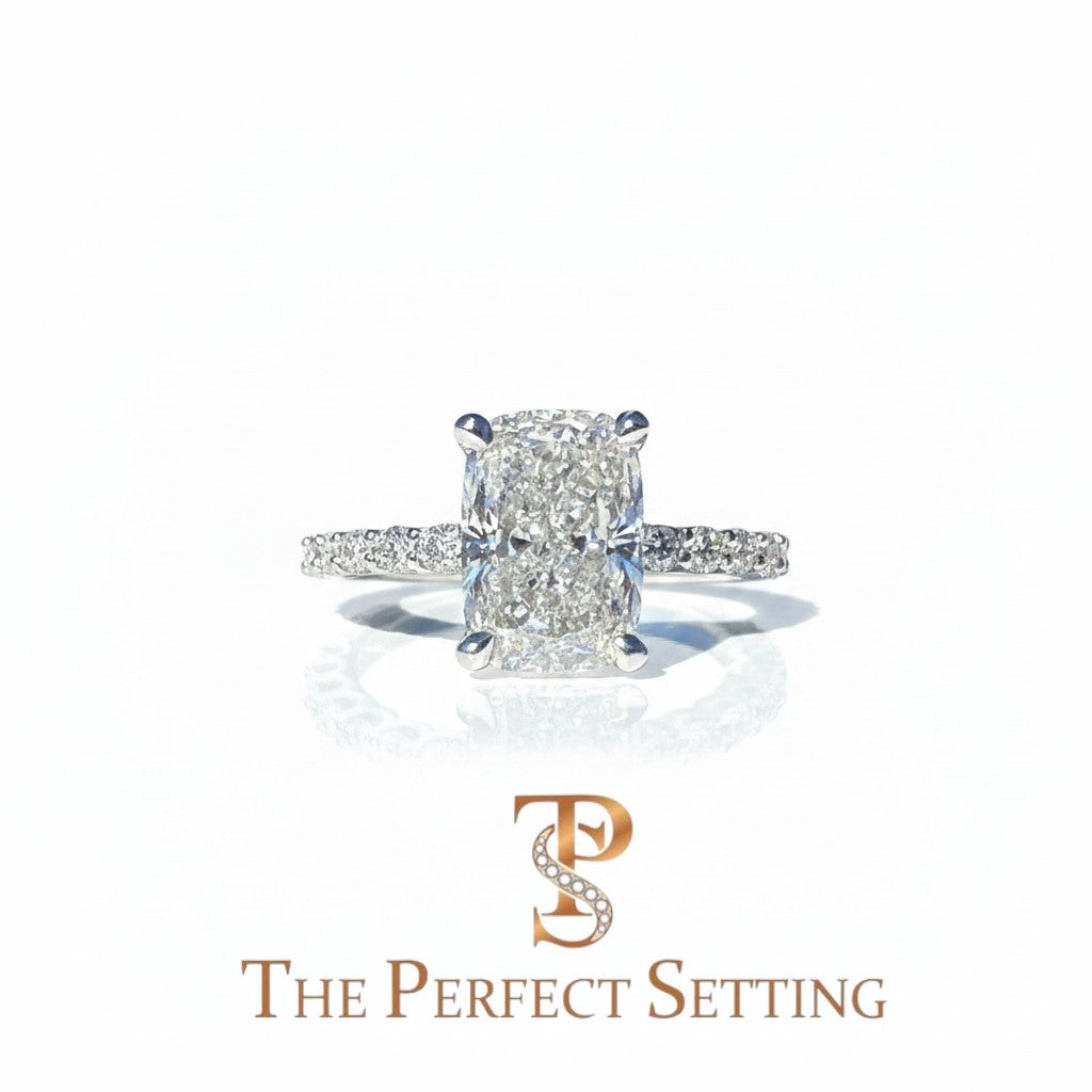The Perfect Setting, Inc. 2.56 ct elongated cushion cut diamond engagement ring with a platinum pavé hidden halo band.