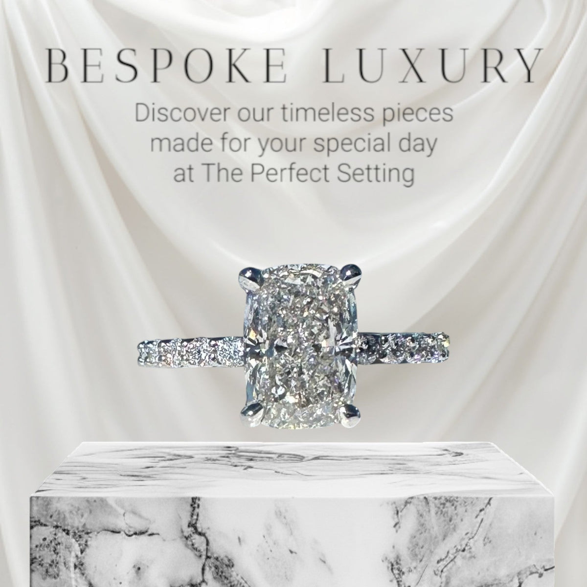 The Perfect Setting, Inc 2.56 ct elongated cushion cut diamond engagement ring with a platinum hidden halo pavé band. bespok