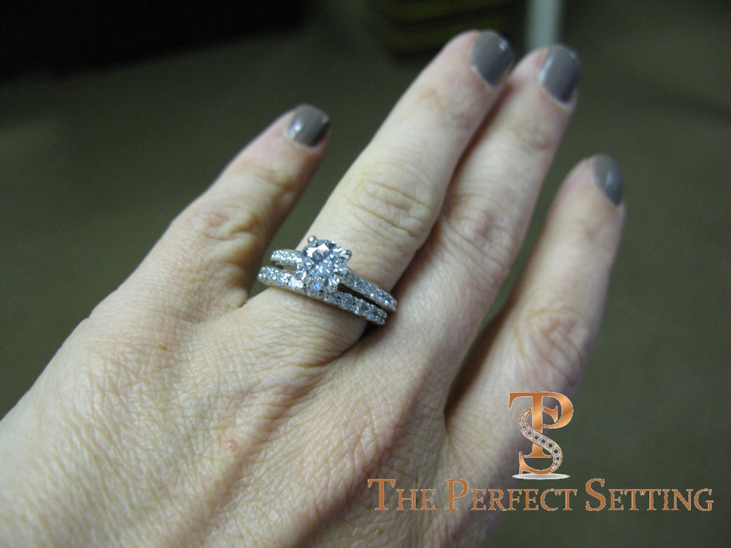 1.2 ct diamond engagement ring with diamond band on hand