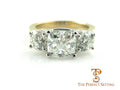cushion cut diamond three stone ring