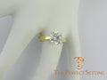 2 ct round diamond yellow gold platinum ring on finger