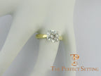 2 ct round diamond yellow gold platinum ring on finger