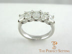5 stone emerald cut diamond wedding band