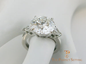 7 ct graft round diamond pear 3 stone engagement ring side view