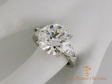 Load image into Gallery viewer, 7 ct graft round diamond pear 3 stone engagement ring  finger