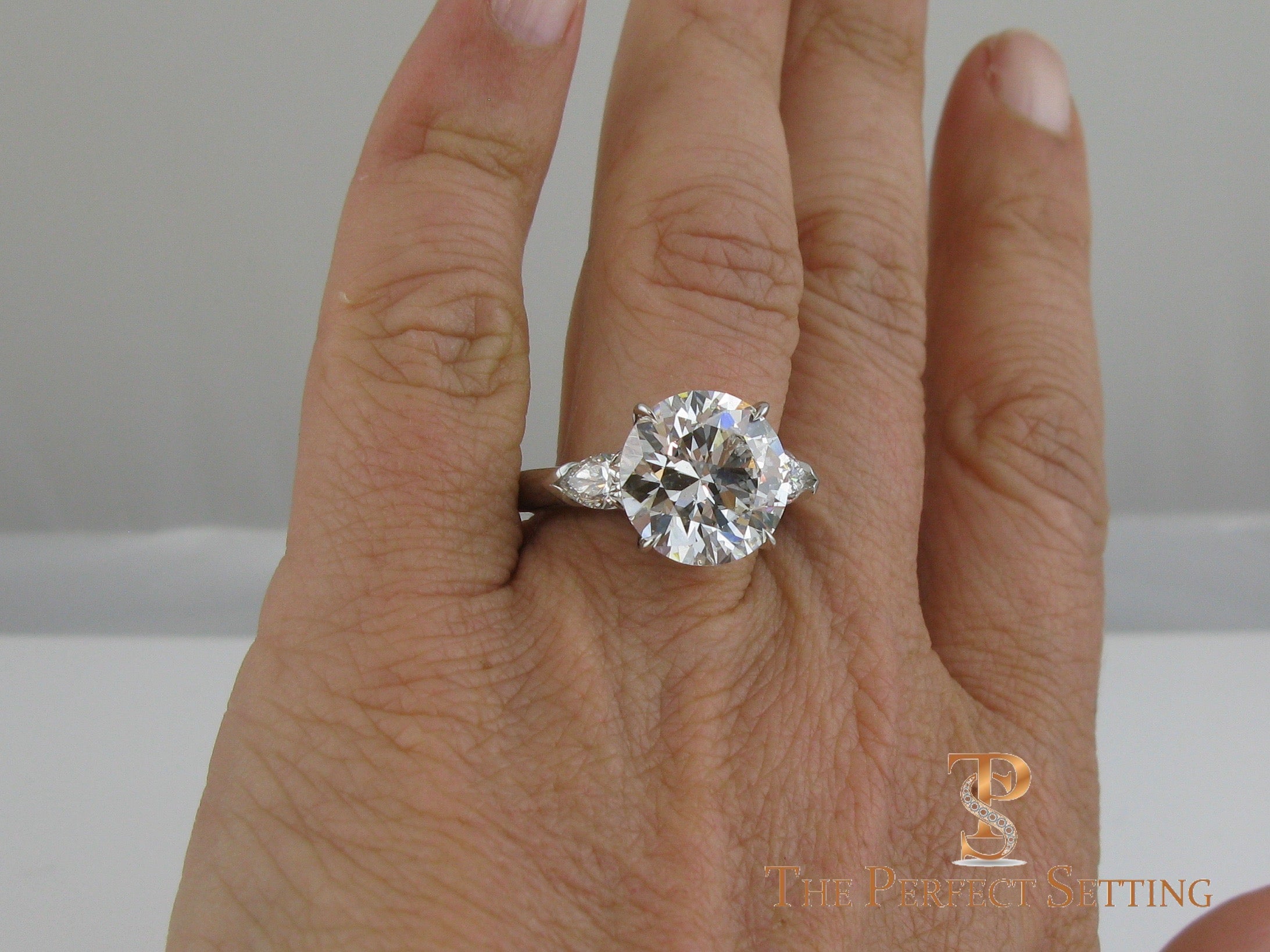 7 ct graft round diamond pear 3 stone engagement ring selfie
