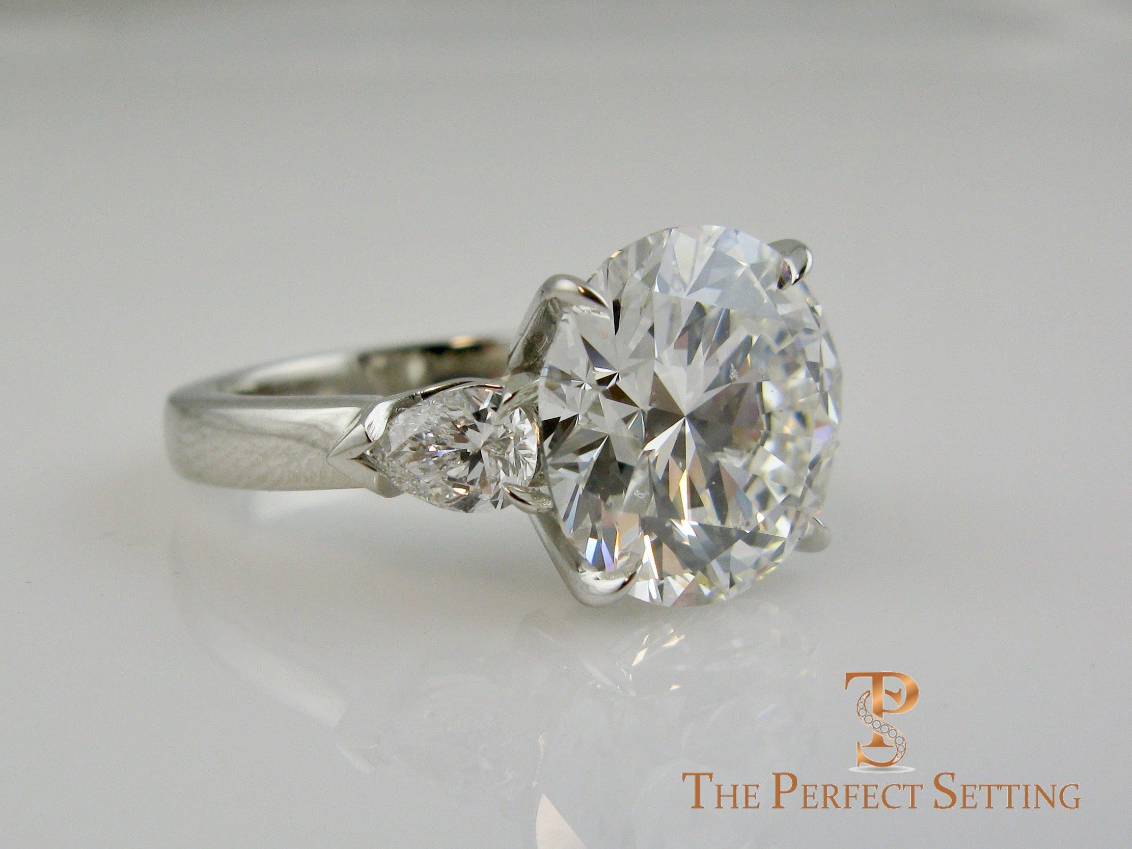 7 ct graft round diamond pear 3 stone engagement ring 