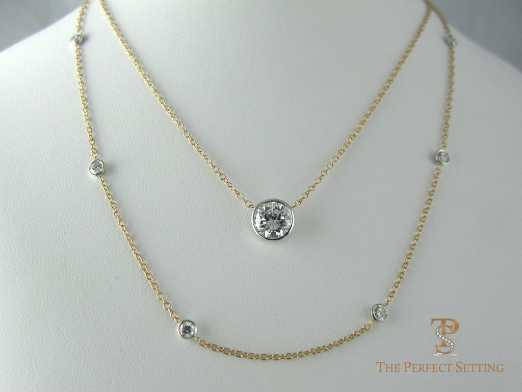 Diamonds bezel set on cable chain in 14K yellow gold