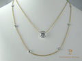 Diamonds bezel set on cable chain in 14K yellow gold