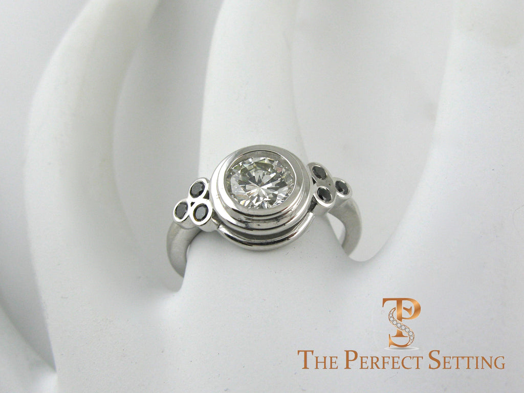 Bezel diamond ring with black diamond accents