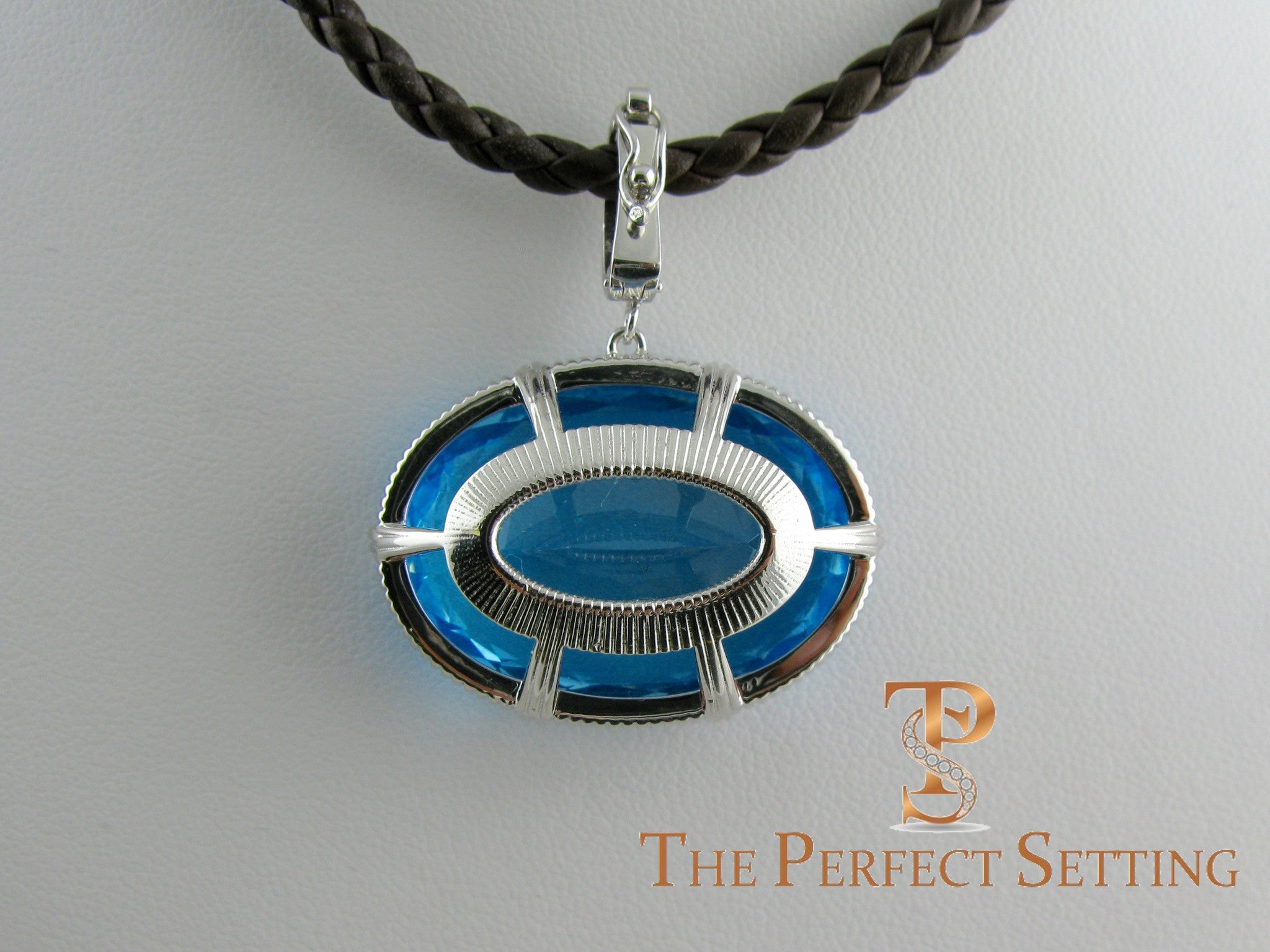 back view of tourmaline on leather cord