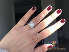 Deco round halo diamond ring selfie