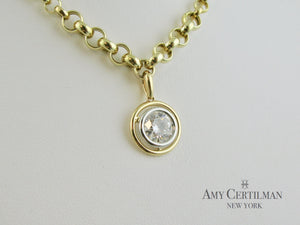 bezel set diamond white and yellow gold pendant