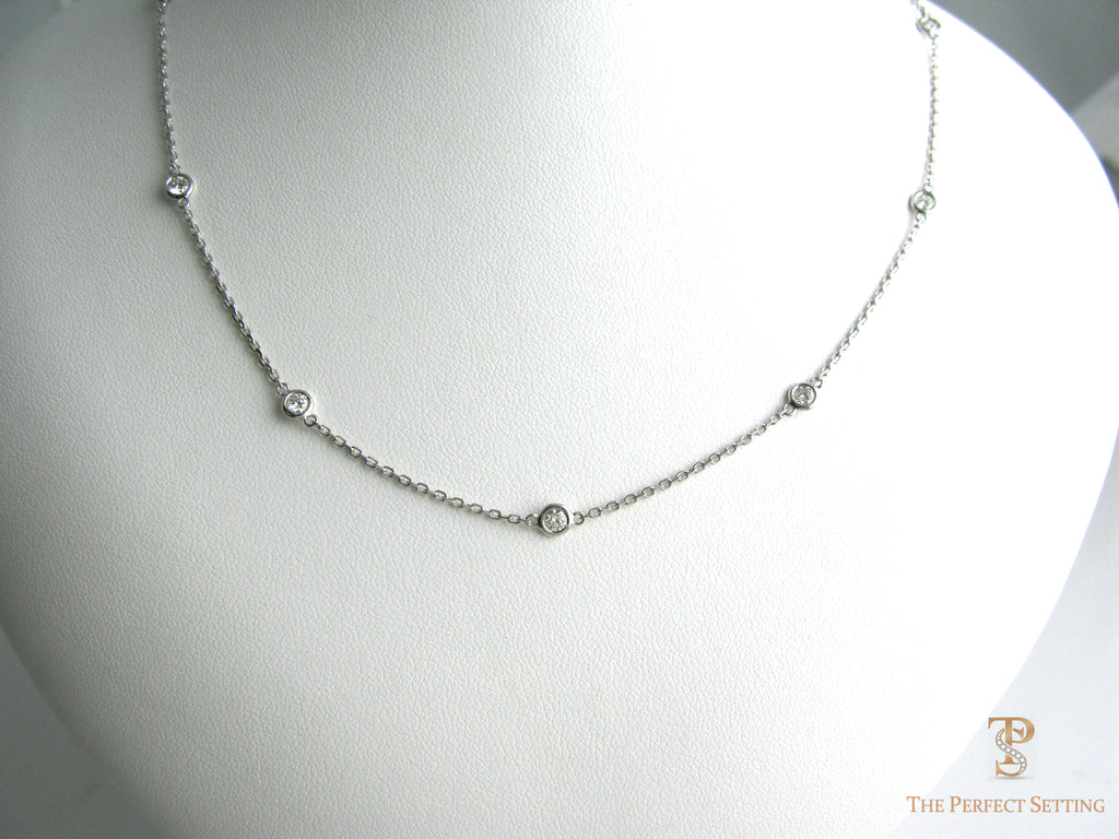 bezel-set necklace round brilliant cut diamonds
