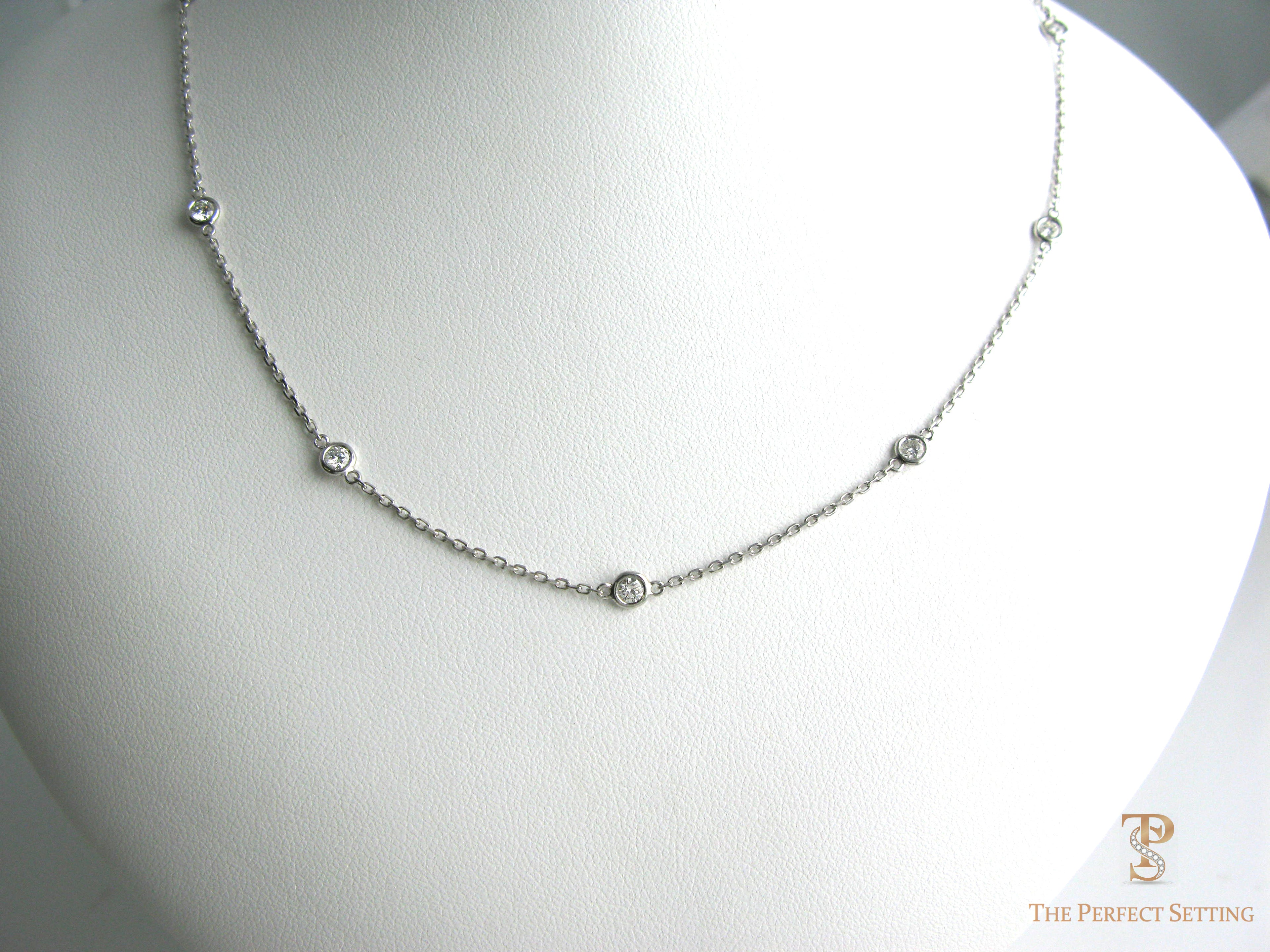 bezel-set necklace round brilliant cut diamonds