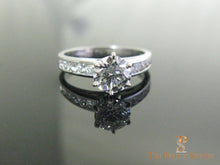 Load image into Gallery viewer, Diamond engagement ring channel setting on black