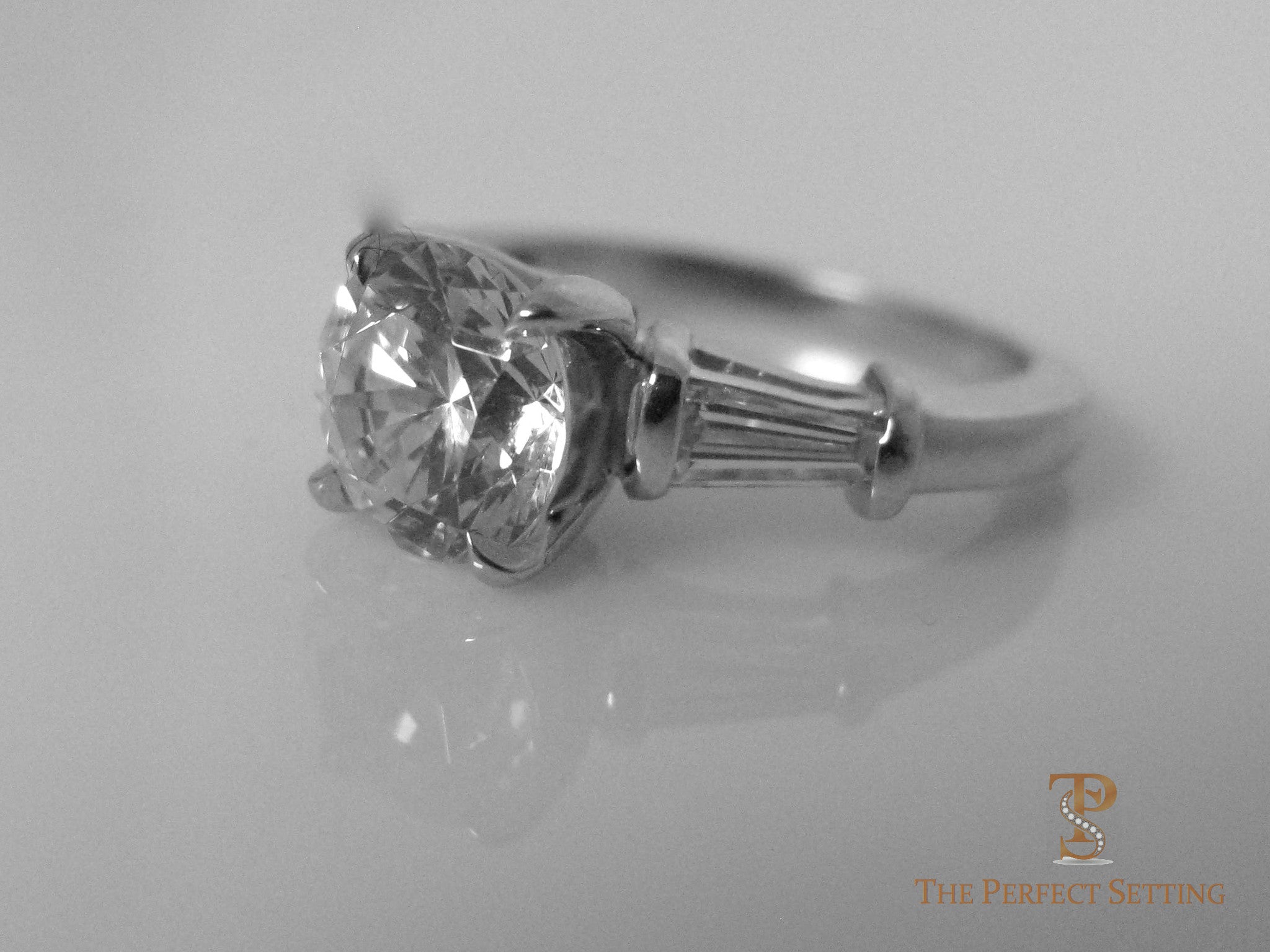 Diamond Solitaire Engagement Ring with Baguettes