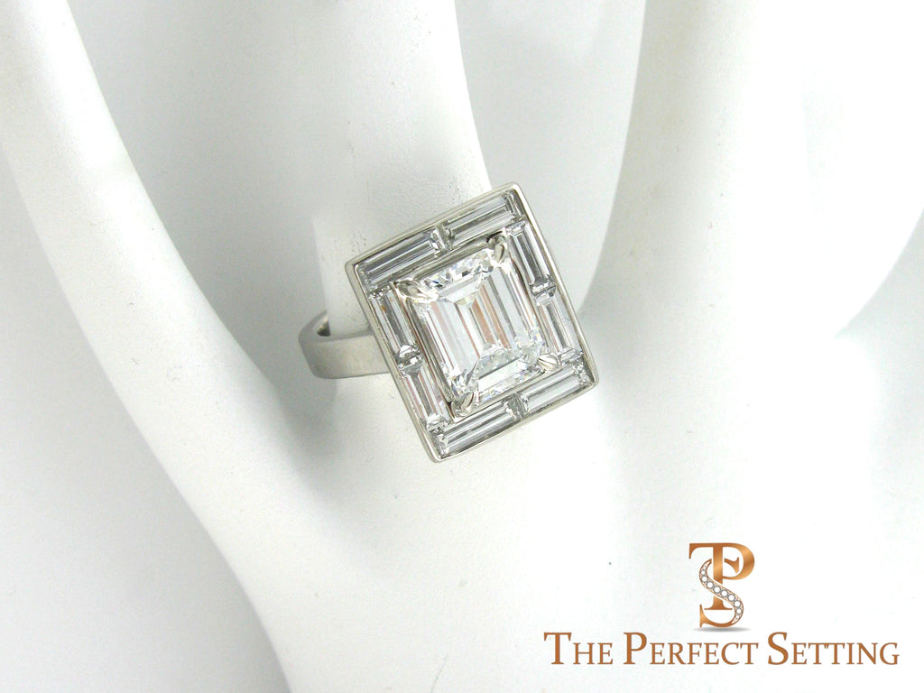 Baguette Halo Emerald Cut Diamond Engagement Ring on finger