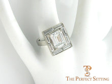 Load image into Gallery viewer, Baguette Halo Emerald Cut Diamond Engagement Ring on finger