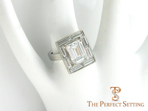 Baguette Halo Emerald Cut Diamond Engagement Ring on finger