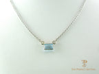 Emerald Cut Aquamarine With Diamond Accents Pendant