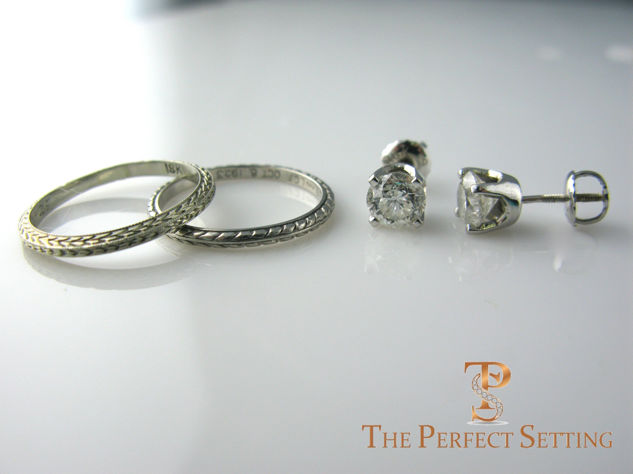 unworn diamond studs BEFORE resetting