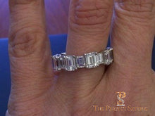 Load image into Gallery viewer, Large and Small Emerald cut diamond eternity band ring selfie