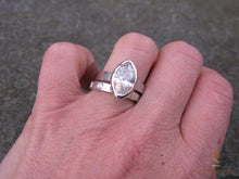 Load image into Gallery viewer, Hammered wedding band with large marquise diamond engagement ring