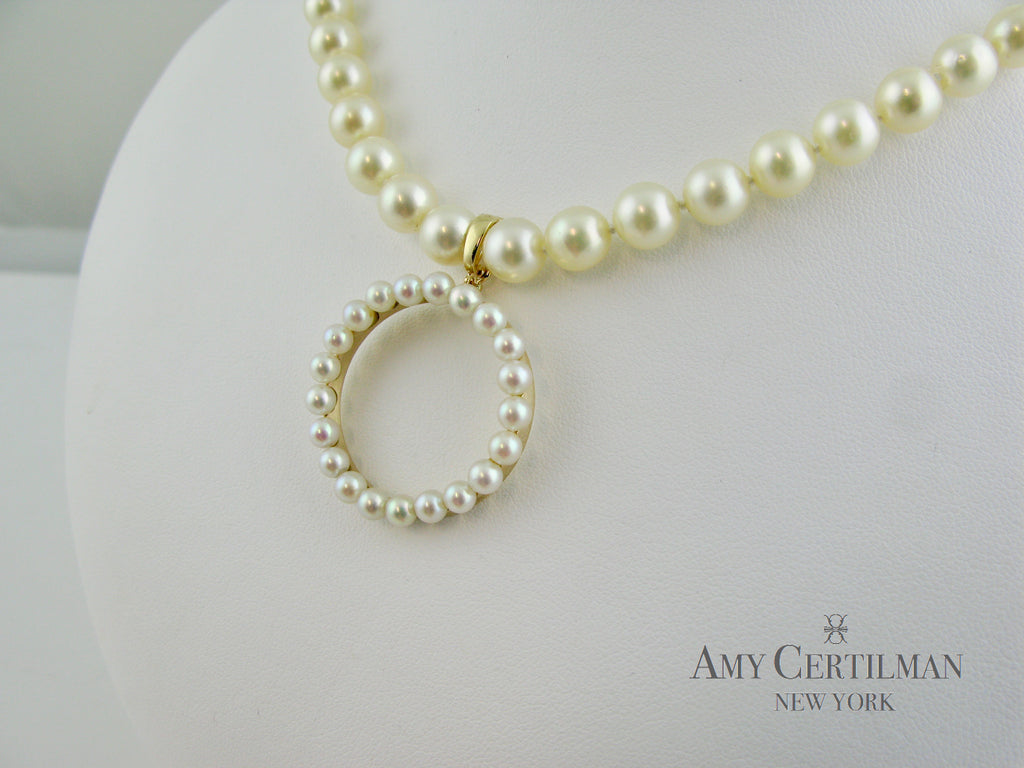 Pearl enhancer on pearl strand