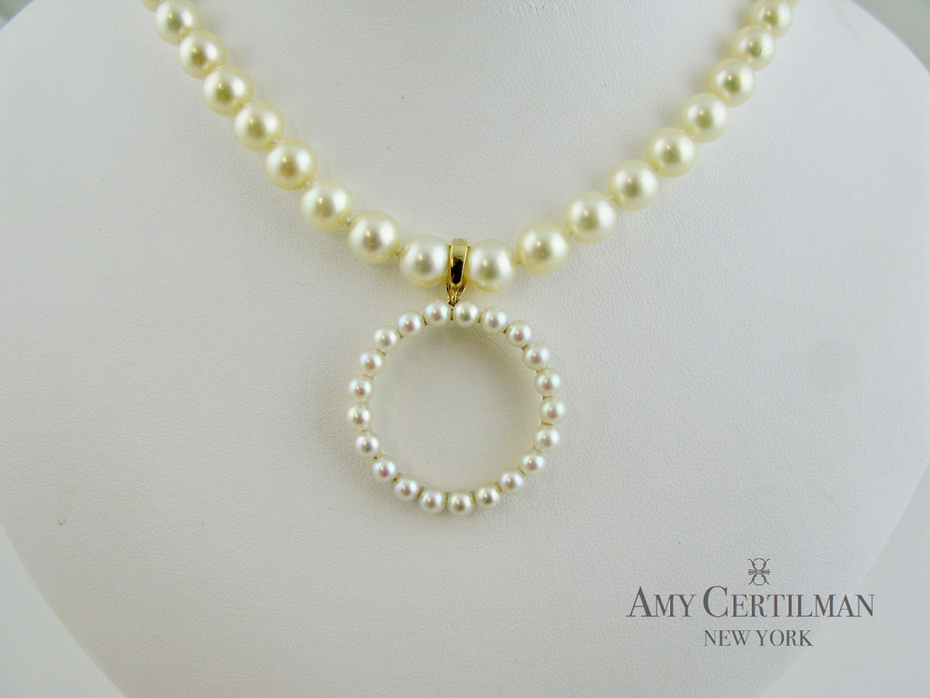 Pearl enhancer on pearl necklace