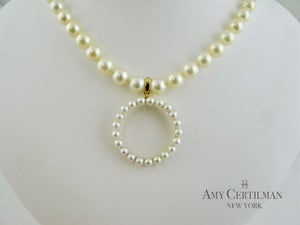 Pearl enhancer on pearl necklace
