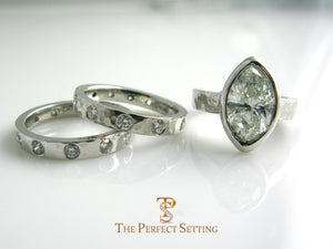 Platinum wedding bands and marquise diamond engagment ring