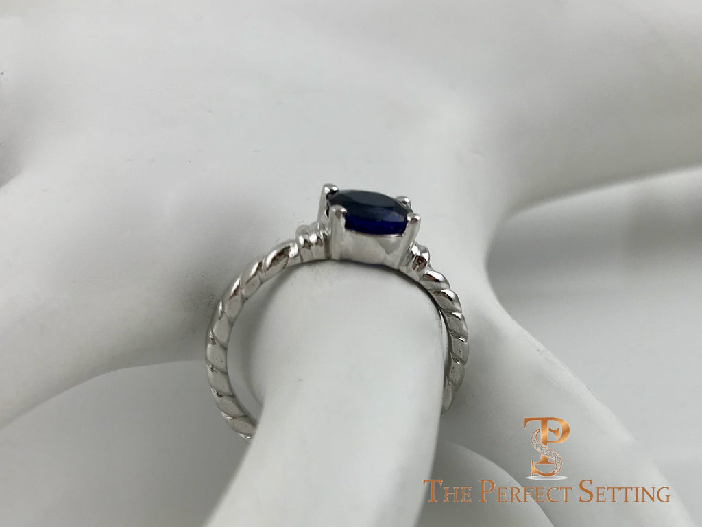 Oval Sapphire Rope Ring side on finger