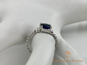 Oval Sapphire Rope Ring side on finger