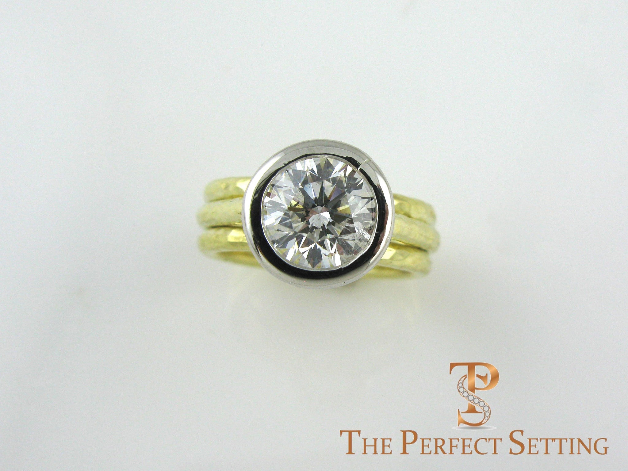Platinum bezel hammered 18K yellow gold right hand ring