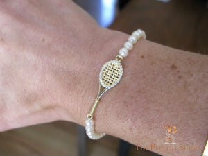 tennis racquet bracelet gold diamonds pearls on wrist