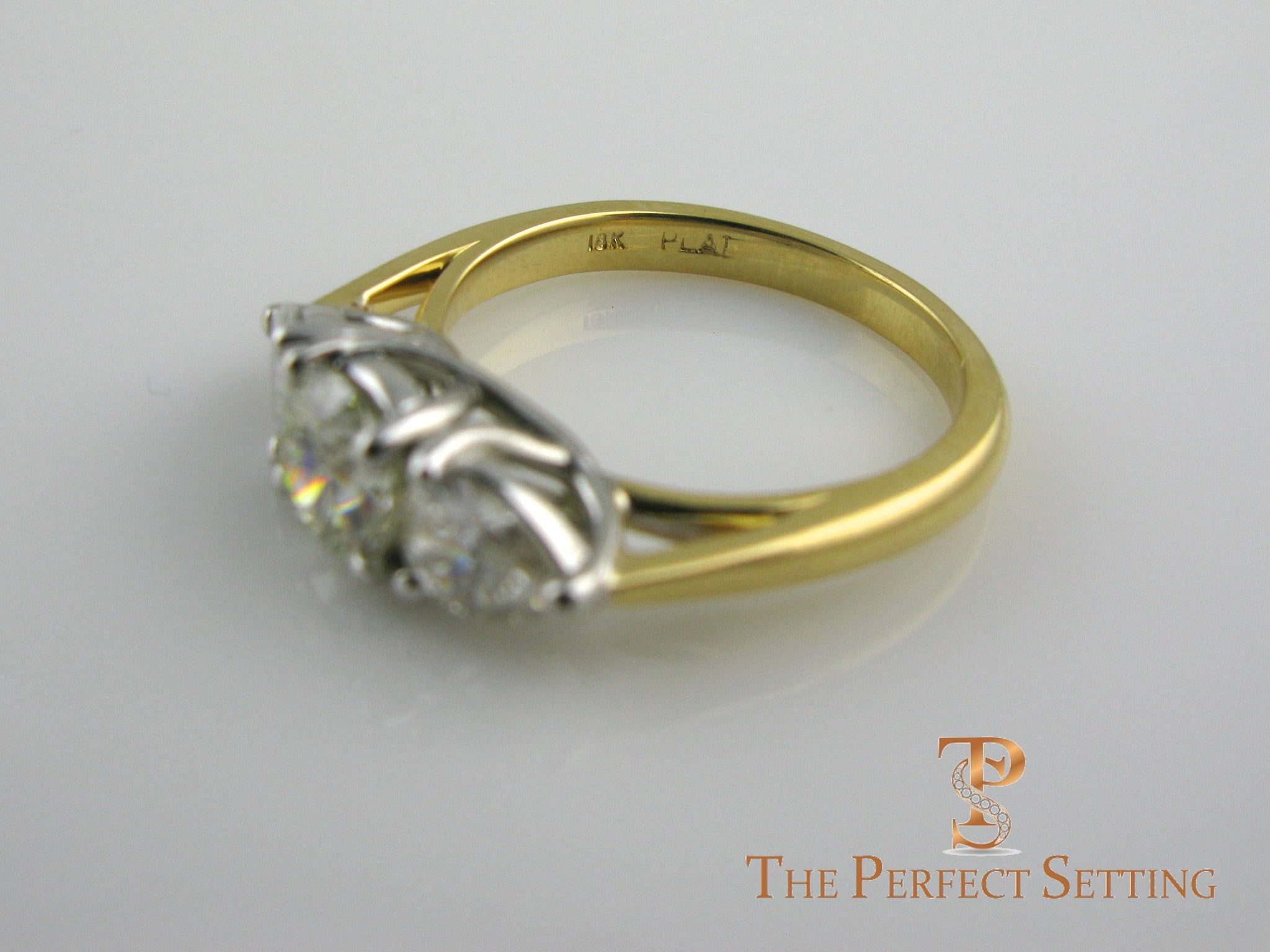 Pear and Round Diamond Three Stone Engagement Ring