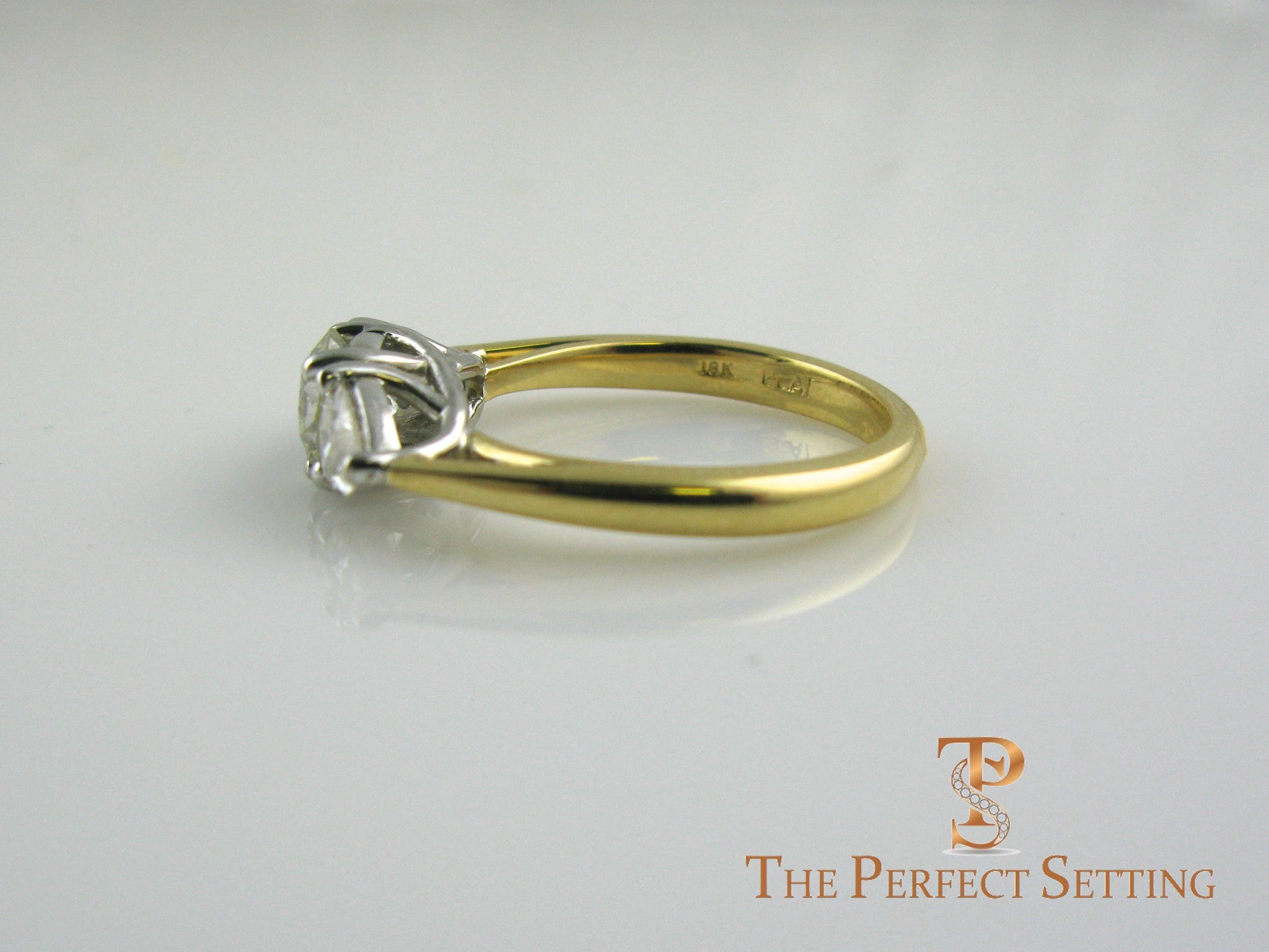 Pear and Round Diamond Three Stone Engagement Ring