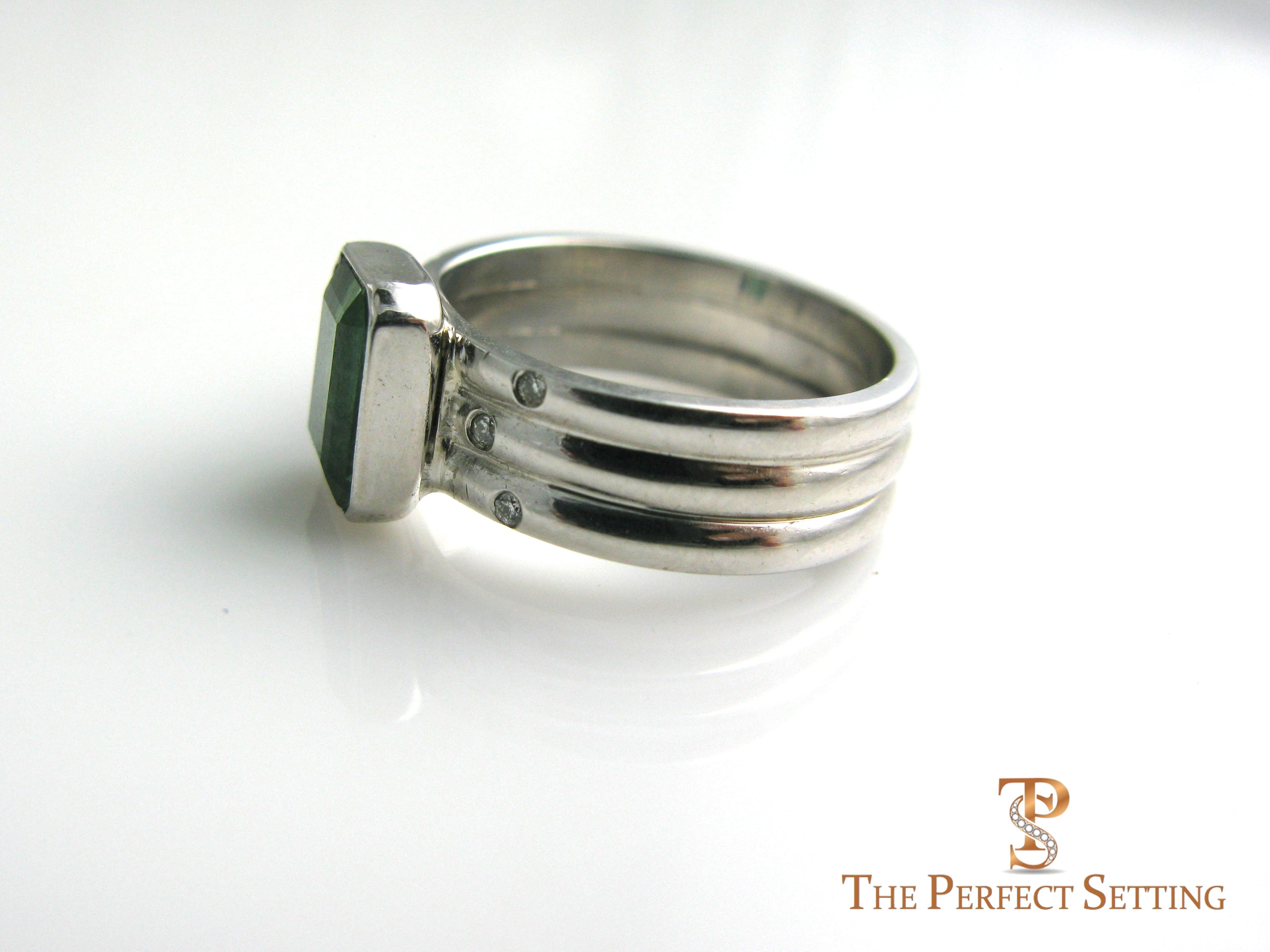 Bezel set tourmaline and diamonds in 14K white gold. .