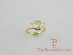 3 stone emerald cut diamond custom bezel set ring