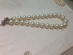 Large south sea pearls diamond clasp