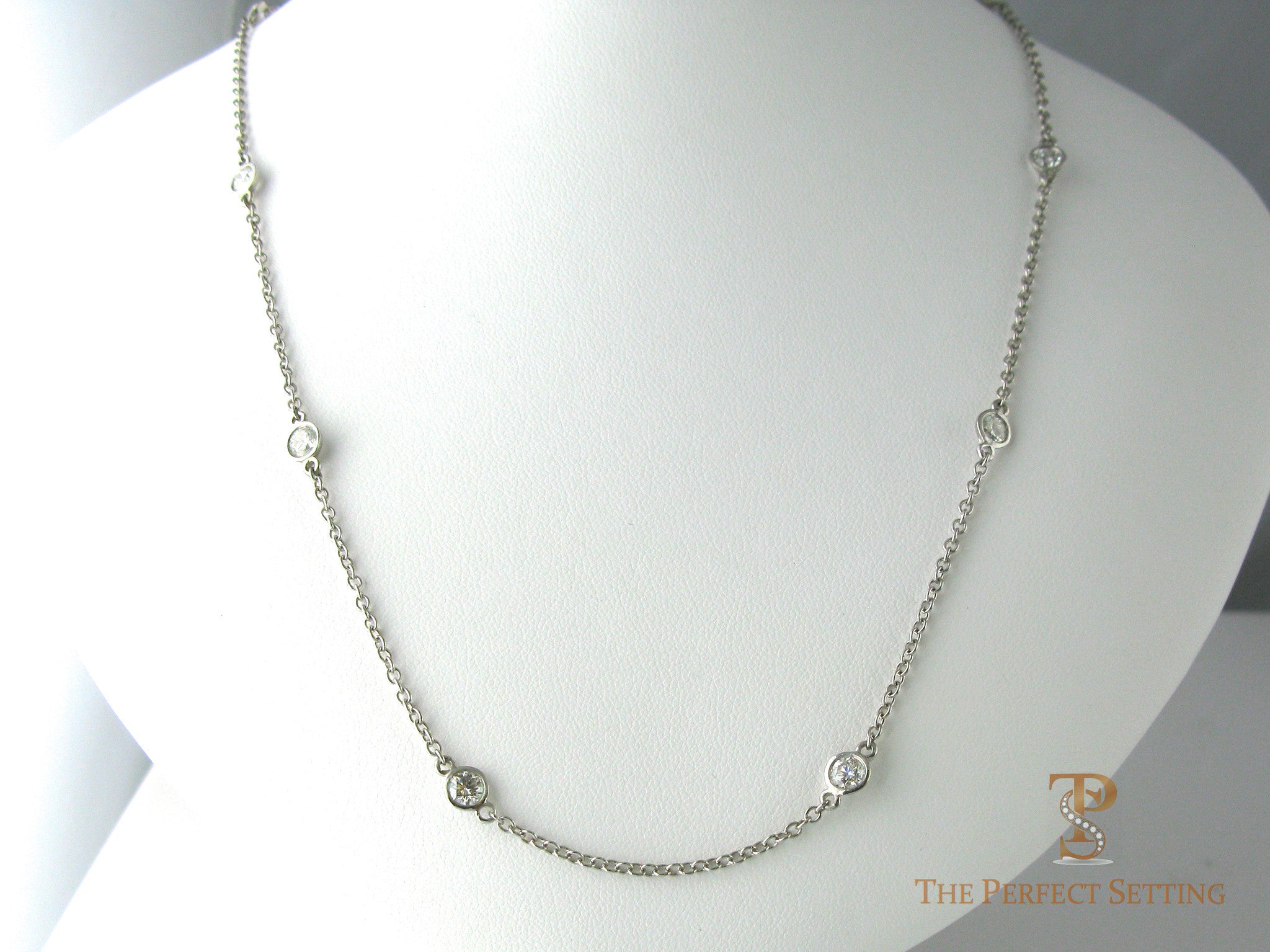 Diamonds bezel set on Platinum Chain